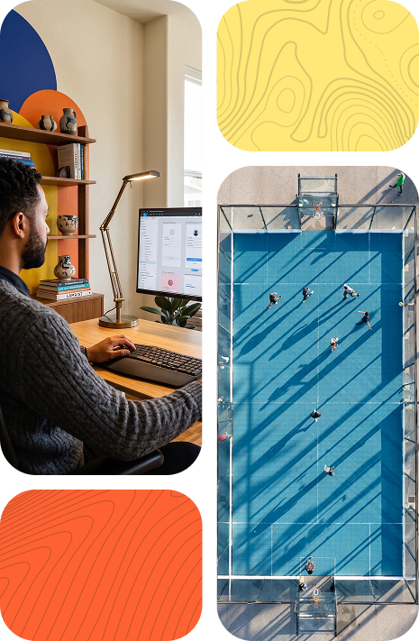 Product designer working at a desktop alongside aerial imagery representing product direction and progress
